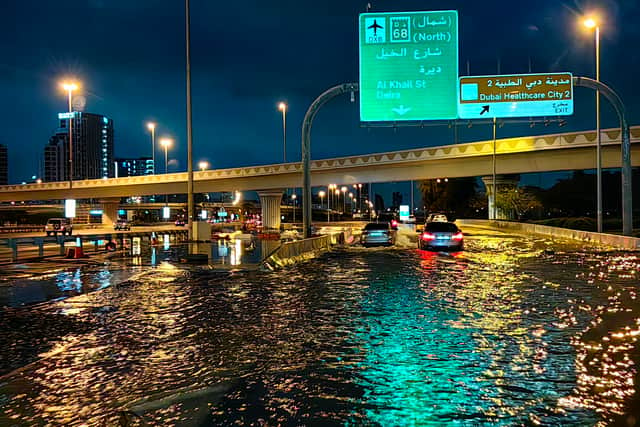 Flash floods have left popular holiday destination Dubai underwater with its main airport flooded and flights cancelled or diverted. (Photo: AFP via Getty Images)