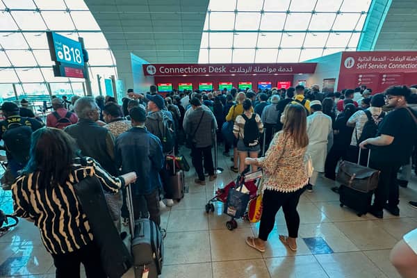 Travel expert shares top tips on what to do if your flight to Dubai is cancelled or delayed amid flash floods - as Emirates cancels more flights. (Photo: AFP via Getty Images)