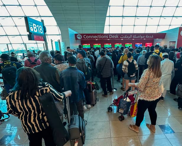 Travel expert shares top tips on what to do if your flight to Dubai is cancelled or delayed amid flash floods - as Emirates cancels more flights. (Photo: AFP via Getty Images)