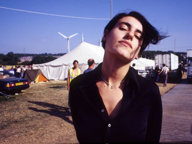 Justine Frischmann , lead singer of Elastica, Glastonbury Festival , United Kingdom, 1998. Newer fans of Blur, who perform tonight at Coachella 2024 once again, have asked who the singer-turned-artist is and her relationship to the group's lead singer, Damon Albarn (Credit: Getty Images)