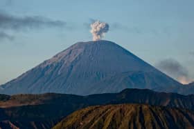 A 31-year-old tourist has died after plunging 250ft into the crater of an active volcano in Indonesia while posing for photos. (Photo: Getty Images)