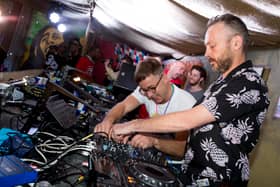 (L-R) Felix Buxton and Simon Ratcliffe of Basement Jaxx perform live on stage at the Red Bull Music Academy Sound System at Notting Hill Carnival at Notting Hill on August 25, 2014. Sources close to the duo have suggested the pair will be performing live once again this year to celebrate their 30th anniversary (Credit:Getty Images)