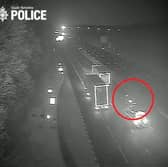 Video grab from footage of a motorist driving the wrong way down the M1. Picture: South Yorkshire Police/SWNS