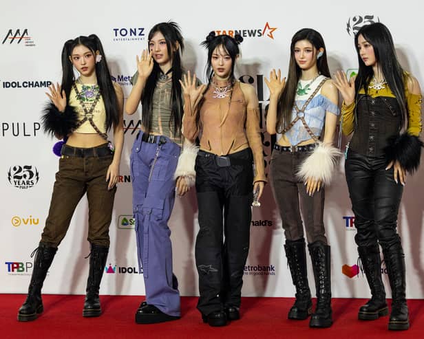 Minji, Hanni, Danielle, Haerin and Hyein of girl group NewJeans attend the 2023 Asia Artist Awards at the Philippine Arena on December 14, 2023 in Bulacan, Philippines. (Photo by Ezra Acayan/Getty Images)