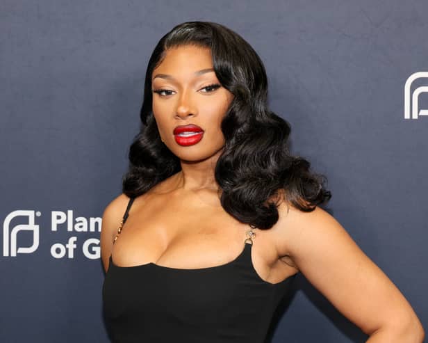 Rapper Megan Thee Stallion has been accused of creating a "hostile" work environment and fat-shaming by her former cameraman Emili Garcia. (Credit: Getty Images)