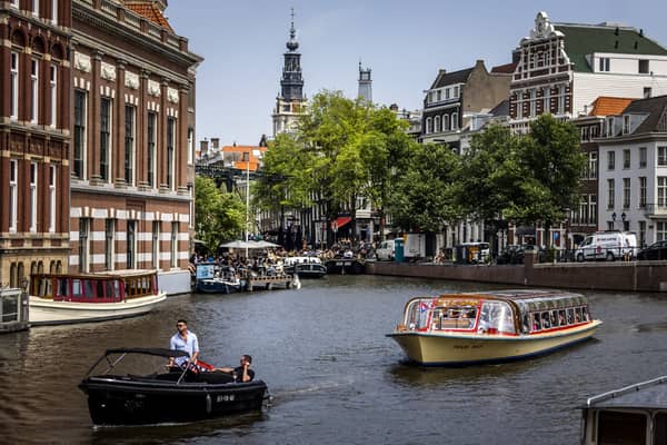 Popular city break destination, Amsterdam, has announced new river cruise rules to deter tourists. (Photo: ANP/AFP via Getty Images)