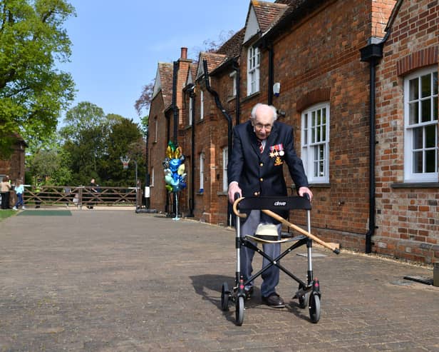 Captain Tom Moore with his walking frame doing a lap of his garden in the village of Marston Moretaine, 50 miles north of London (Photo: JUSTIN TALLIS/AFP via Getty Images)
