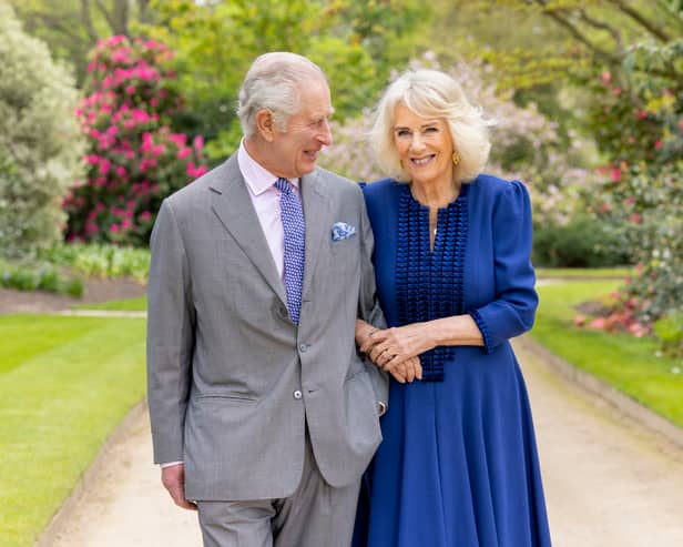 King Charles III and Queen Camilla, taken by portrait photographer Millie Pilkington, in Buckingham Palace Gardens on April 10, the day after their 19th wedding anniversary, and is being released to mark the first anniversary of their Coronation