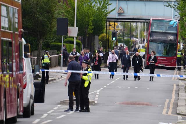 A 13-year-old boy has been killed in an attack which saw a man wielding a sword in the street arrested by Met Police. (Credit: 