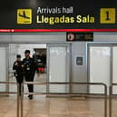 A passenger about to board a flight to Manchester from Malaga Airport was arrested by police after officers found 13 kilos of drugs in his suitcase. (Photo: AFP via Getty Images)