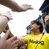 The lead singer of US rock group Alien Ant Farm reaches out to fans in front of the Apollo stage at the Sonisphere rock festival at Knebworth on August 1 2009. The group are set to tour the UK with CKY towards the end of 2024 (Credit: Getty)