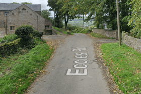 A body was found following a burglary in a Derbyshire village