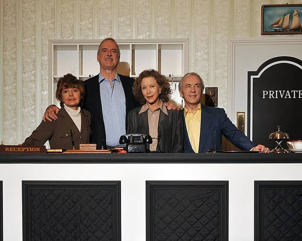 John Cleese reveals twist on reboot of highly-anticipated classic TV show Fawlty Towers. (From L to R) Actors Prunella Scales, John Cleese, Connie Booth and Andrew Sachs pose for photographs as the original cast members of the British comedy programme "Fawlty Towers" attend a press conference in central London, on May 6, 2009. The event was held to promote a new documentary marking the 30th anniversary of the 70's sitcom