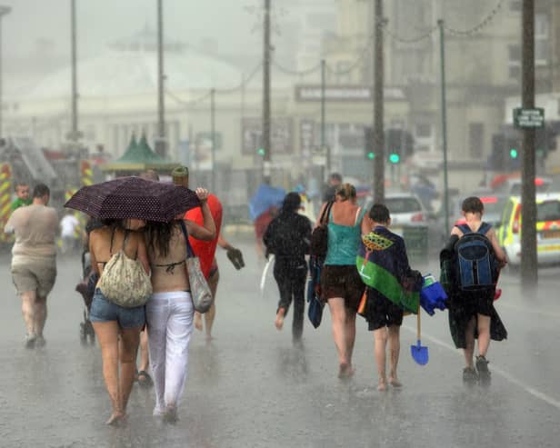 While temperatures are expected to be high, some regions of the UK will be hit with "unsettled" conditions this bank holiday weekend. (Credit: Getty Images)