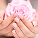 Four French manicure ideas, including classic and modern designs, recommended by a celebrity Mylee manicurist. Stock image by Adobe Photos.
