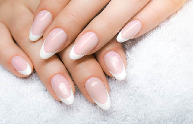 A classic French manicure. Stock image by Adobe Photos.