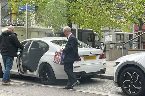 Nigel Farage pictured using a disabled parking bay for a 45-minute M&S shop. You can see the disabled writing in the bottom left. Credit: SWNS