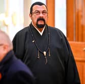 Eyebrows were raised after US actor Steven Seagal made an appearance at Vladimir Putin's inauguration. (Credit: Getty Images)