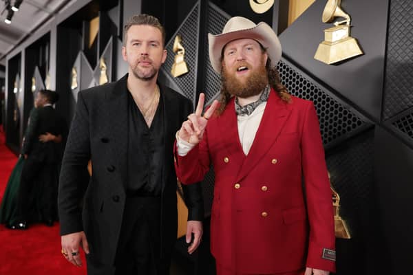 (L-R) T.J. Osborne and John Osborne of Brothers Osborne attend the 66th GRAMMY Awards. The brothers have announced a UK tour set to take place in early 2025 earlier this afternoon (Credit: Neilson Barnard/Getty Images for The Recording Academy)