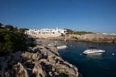 Binibeca Vell, a coastal village in Spain’s Balaeric island of Menorca, is threatening to close due to the amount of tourists in the region booming. (Photo: AFP via Getty Images)