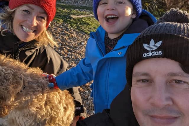Emily, 42, her husband Dan, 41, with their son, Hugo, four and their dog (Kennedy News)