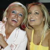 Nicole Richie (L) and Paris Hilton during the premiere party for "The Simple Life" on December 2, 2003 at Bliss in Los Angeles, California. (Photo by Doug Benc/Getty Images)  