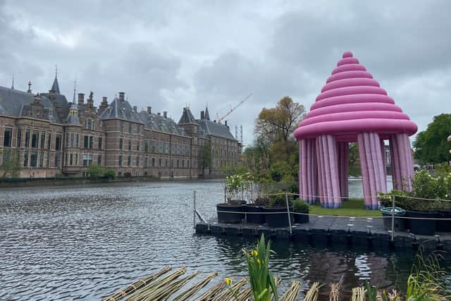 A pink inflatable tower stands proud on the lake in The Hague. (Photo: Isabella Boneham)
