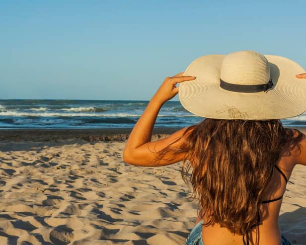 How to manage your hair on holiday: Advice for hair expert Sarah McKenna plus the best products to use  (Canva Images) 