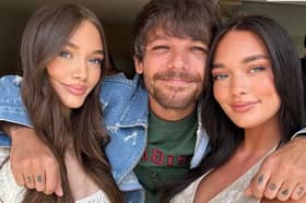 Louis Tomlinson with his twin sisters Daisy and Phoebe. Photo by Instagram/ @the.daisytomlinson