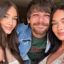 Louis Tomlinson with his twin sisters Daisy and Phoebe. Photo by Instagram/ @the.daisytomlinson