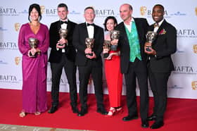Toni Ireland (first left), Tim Harcourt (third left), Stephen Lambert (fifth left) and Stephen Yemoh (sixth left) pose with the Reality Award for 'Squid Game: The Challenge' in the Winners Room during the 2024 BAFTA Television Awards.