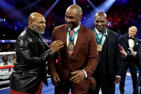 Lennox Lewis (C) could follow in footsteps of Mike Tyson (L) and Evander Holyfield (R)