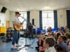 Ed Sheeran surprises primary school students with concert