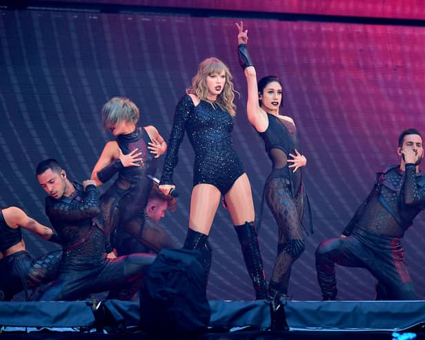 Taylor Swift on stage during the Reputation Stadium Tour at Wembley Stadium in 2018 Her Eras tour will provide a £997 million boost Picture: Ian West/PA Wire 