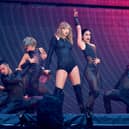 Taylor Swift on stage during the Reputation Stadium Tour at Wembley Stadium in 2018 Her Eras tour will provide a £997 million boost Picture: Ian West/PA Wire 