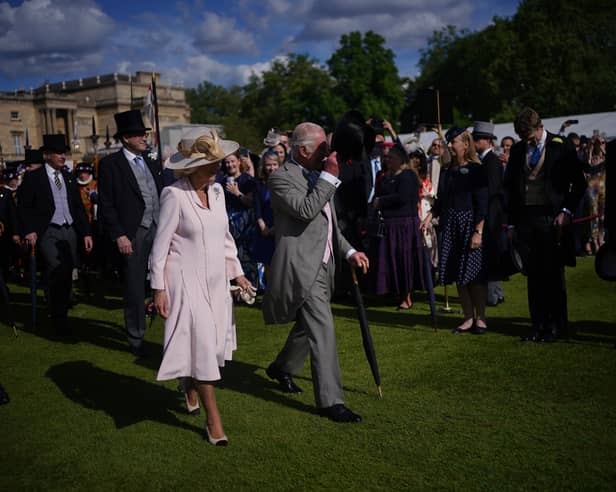 King Charles III and Queen Camilla during The Sovereign's Creative Industries Garden Party at Buckingham Palace, London, in celebration of the Creative Industries of the United Kingdom.