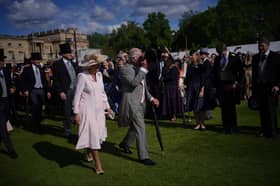 King Charles III and Queen Camilla during The Sovereign's Creative Industries Garden Party at Buckingham Palace, London, in celebration of the Creative Industries of the United Kingdom.