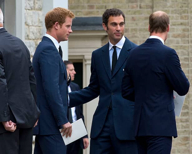 Prince Harry, Prince William and Hugh van Custem as the requiem mass for his late father Hugh van Cutsem in 2013