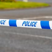 Police have called for witnesses after a man was stabbed while walking in a field in Dumbarton 