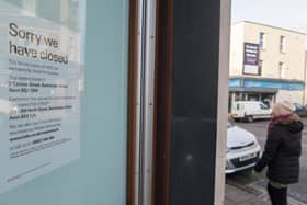 A notice of closure is displayed in a window of a closed branch of HSBC bank in 2017 (Photo: Matt Cardy/Getty Images)