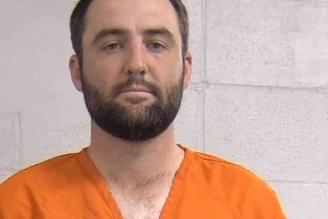 Screen grab taken from the Louisville Metropolitan Department of Corrections of Scottie Scheffler's mugshot. World number one Scottie Scheffler has been detained by police for reportedly attempting to get around a traffic jam caused by a fatal accident near Valhalla.
