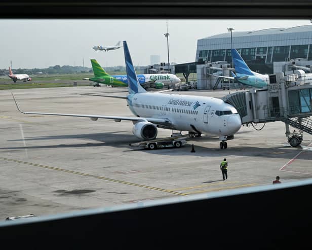 An airline ground staff member fell off an Airbus plane after two colleagues removed the stairs as he was about to step out. (Photo: AFP via Getty Images)