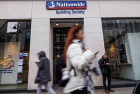 Members of the public walk past a branch of Nationwide Building Society (Photo: Dan Kitwood/Getty Images)