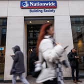 Members of the public walk past a branch of Nationwide Building Society (Photo: Dan Kitwood/Getty Images)