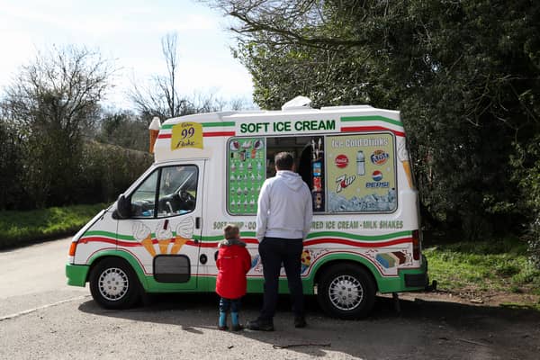 A family enjoy an ice cream in March 2020 (Photo: Catherine Ivill/Getty Images)