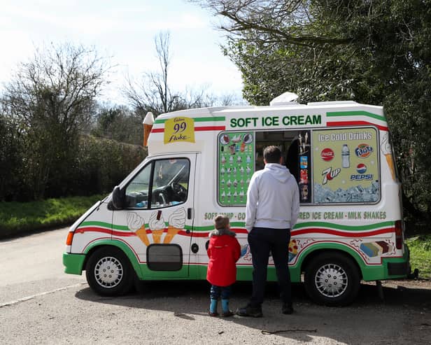 A family enjoy an ice cream in March 2020 (Photo: Catherine Ivill/Getty Images)