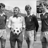 Aston Villa manager Tommy Docherty, wearing the pale shirt, with new signings (left to right) Bruce Rioch, Ian 'Chico' Hamilton and Neil Rioch, at Villa Park in 1969