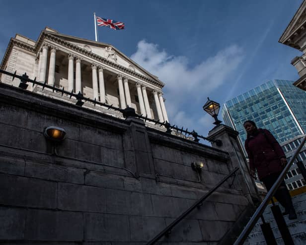 A woman walks down to Bank underground station next to the Bank of England (Photo: Chris J Ratcliffe/Getty Images)