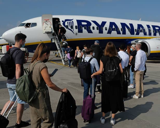 People board a Ryanair flight to Spain at Berlin Brandenburg Airport in September 2021 (Photo: Sean Gallup/Getty Images)