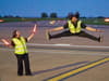 Radio 1’s Big Weekend 2024: Airport ground handlers perform dance routine for stars arriving for festival